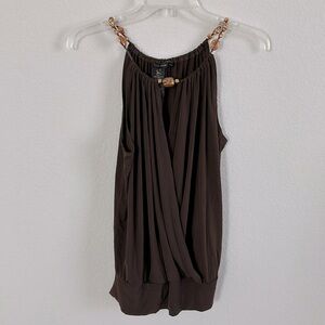 Women Brown sleeveless top with rock details. Size M